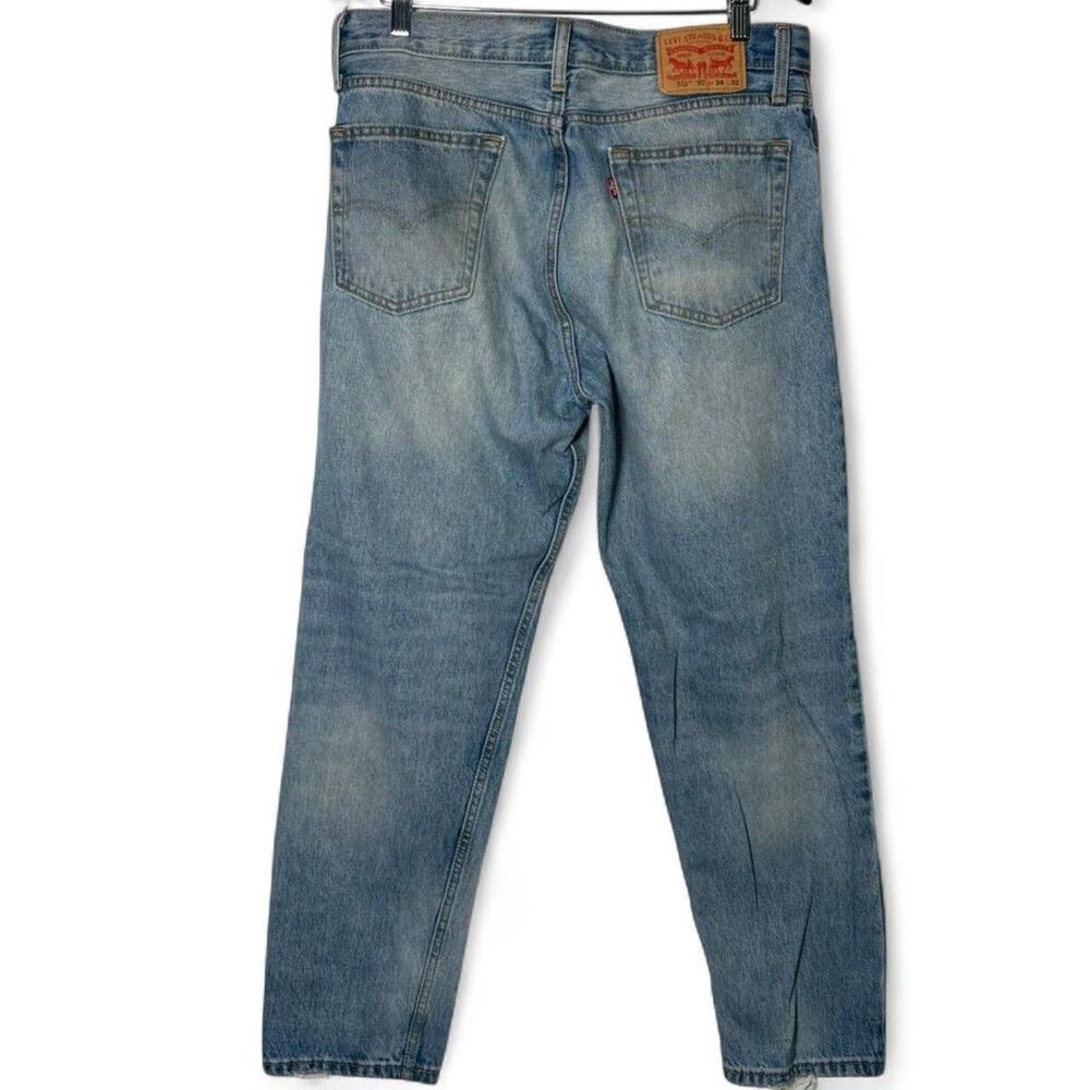 Levi's 550 '92 Early 2010s Reissue Light Wash Distressed Jeans 34x32 - Picture 4 of 11